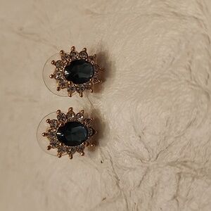 Amethyst simulant center stone with diamond simulant accent gems